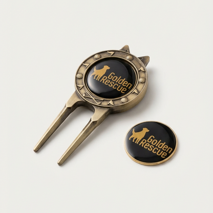 Gold and black divot tool with 'Golden Rescue' logo on a white background